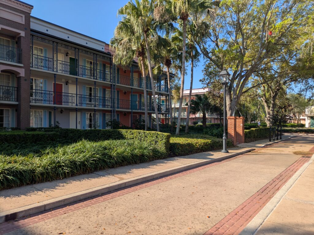 A scenic shot of the colorful wrought iron buildings and cobblestone streets at Disney's Port Orleans French Quarter.